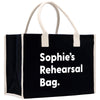 a black and white shopping bag with white handles
