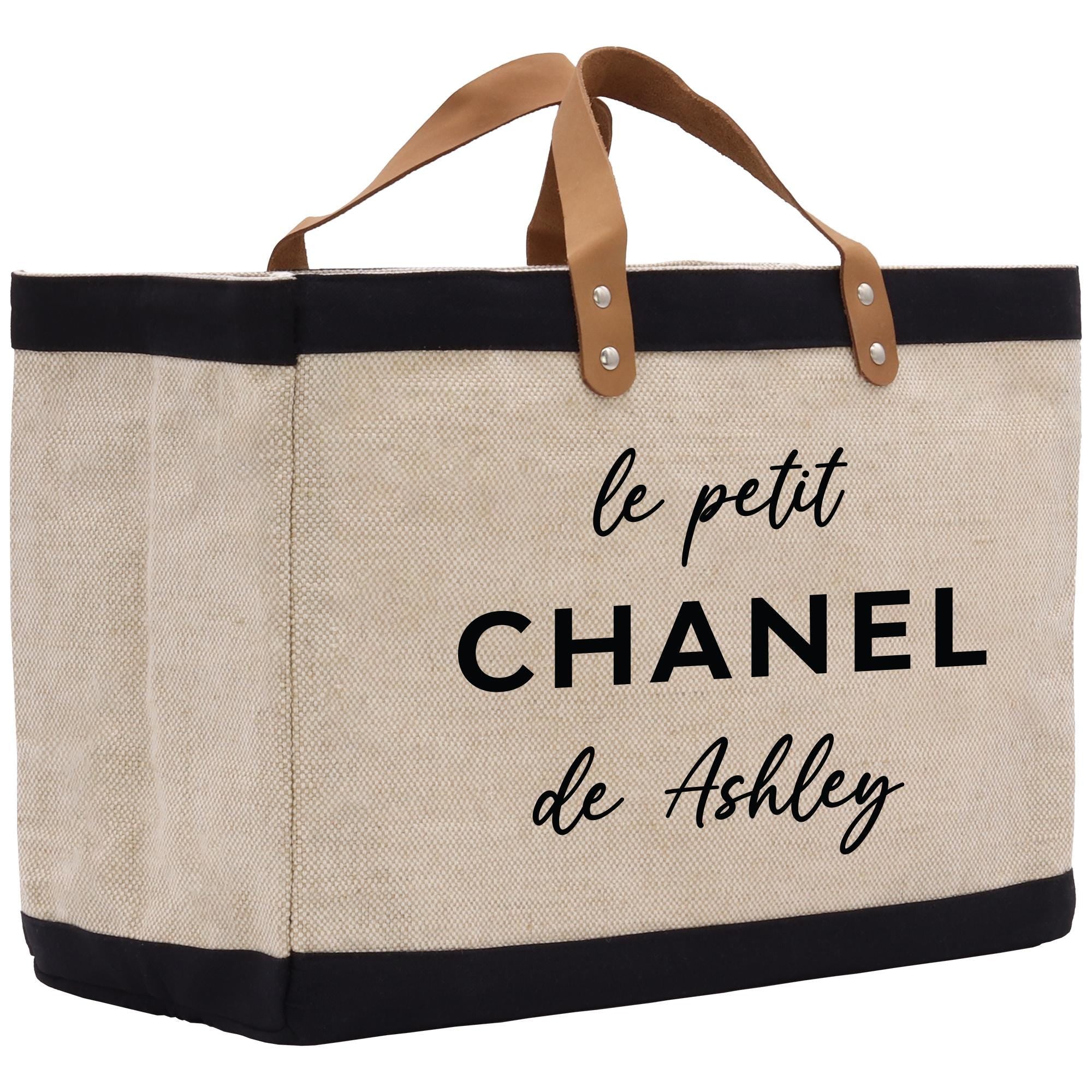 a canvas bag with the words le petit chanel de abiley on it