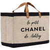 a canvas bag with the words le petit chanel de abiley on it