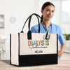a woman in a blue shirt is holding a black and white bag