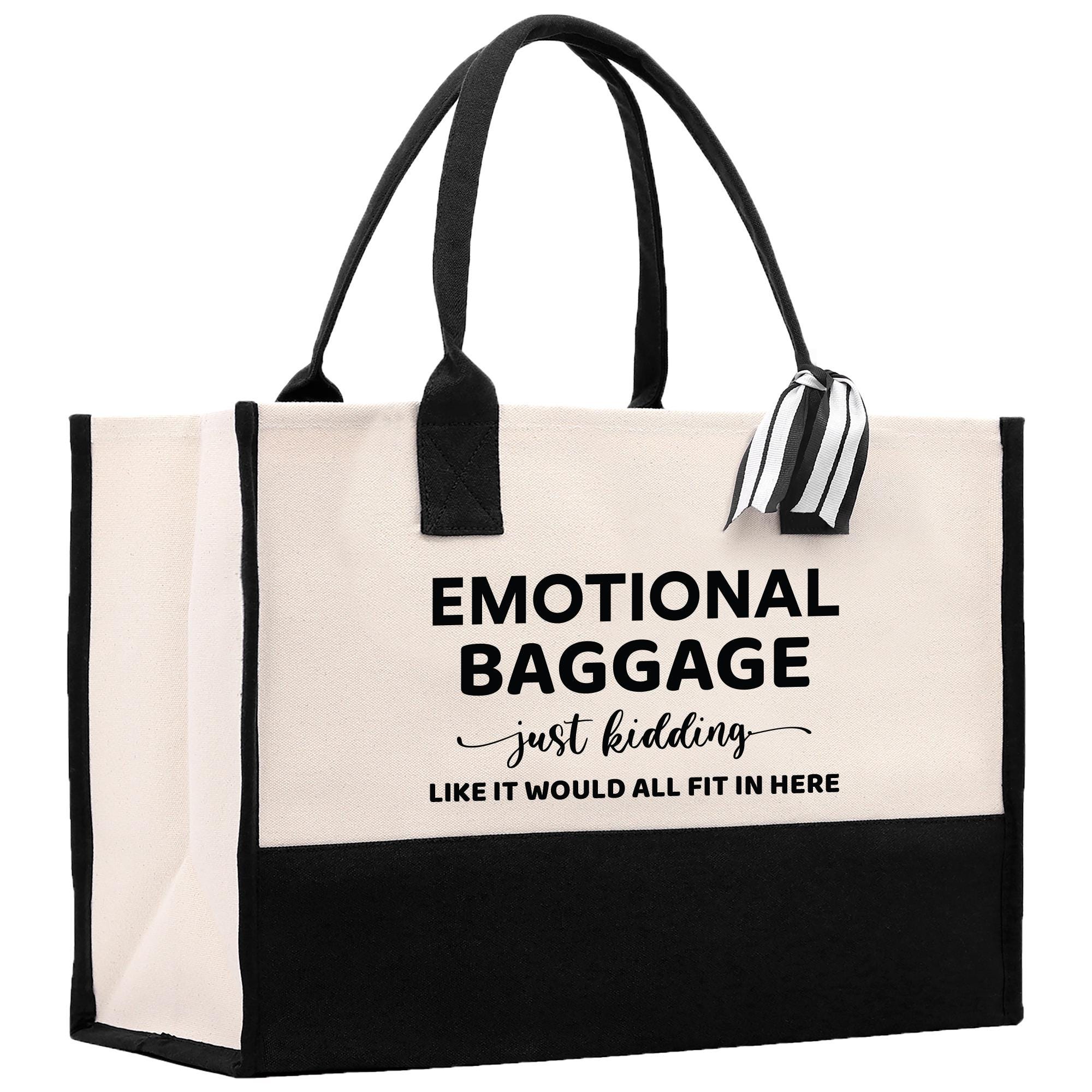 a white and black bag with a black handle