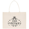 A beige canvas tote bag with a black text design that reads 
