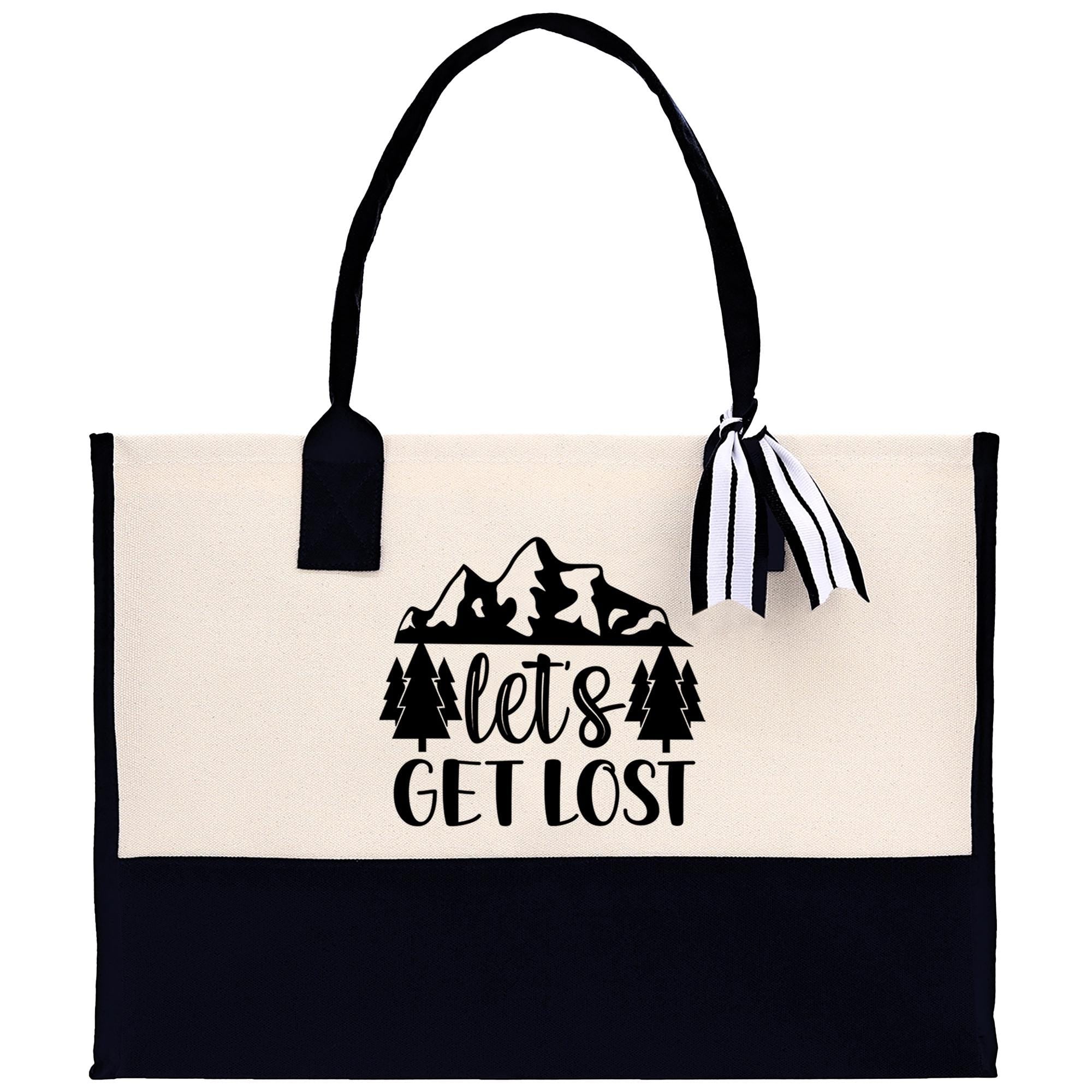 A black and white tote bag with a printed design and text on it.