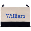 A beige canvas tote bag with the name "William" printed in blue on it.