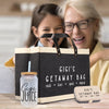 a woman and a girl are looking at a bag