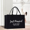 a black tote bag with the words just married printed on it