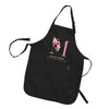 A black apron with a pink floral design and the initials "M" on it.