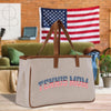 a canvas tote bag with an american flag on it