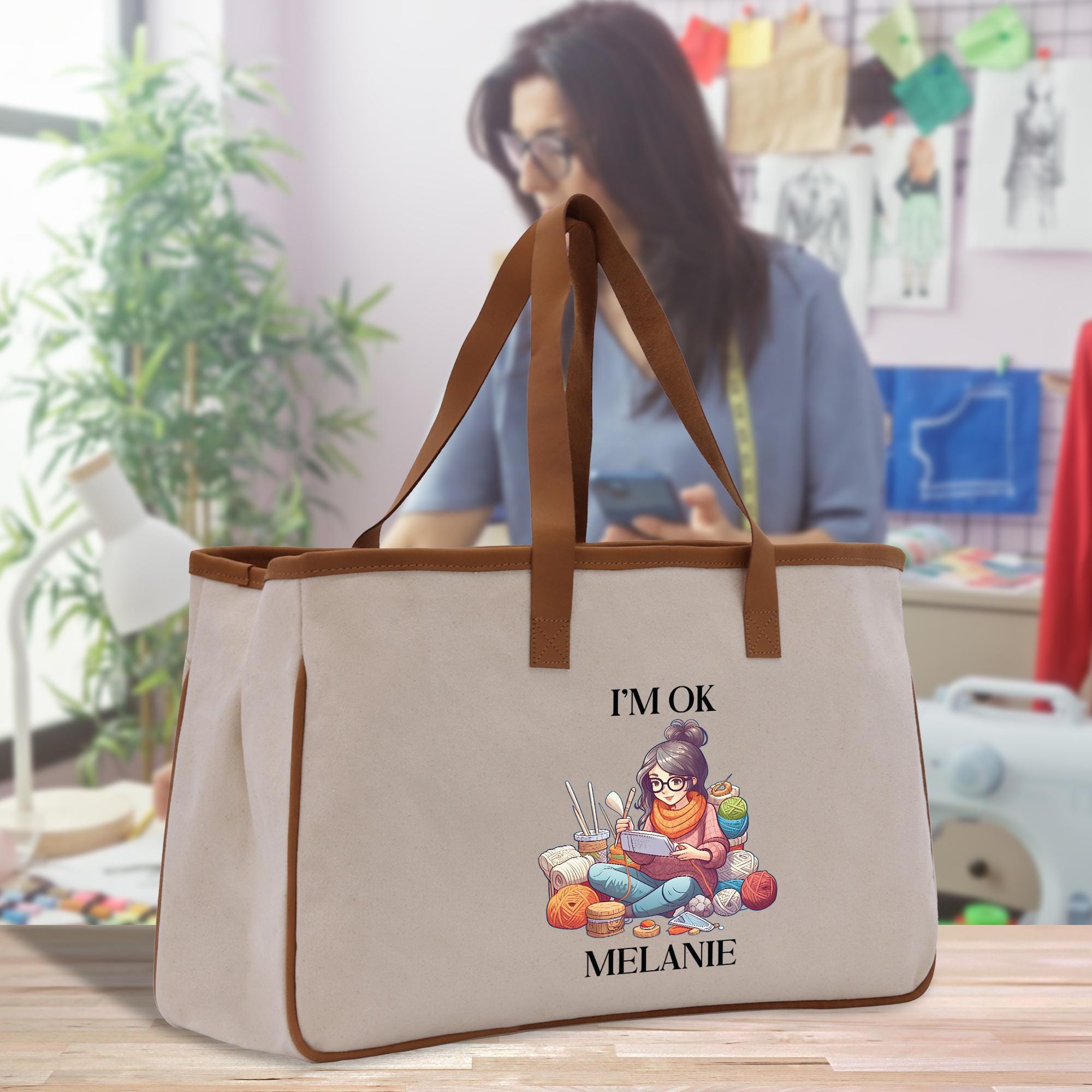 a woman holding a bag with a picture of a cartoon character on it