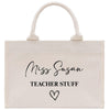 a white bag with the words miss susan teacher stuff on it