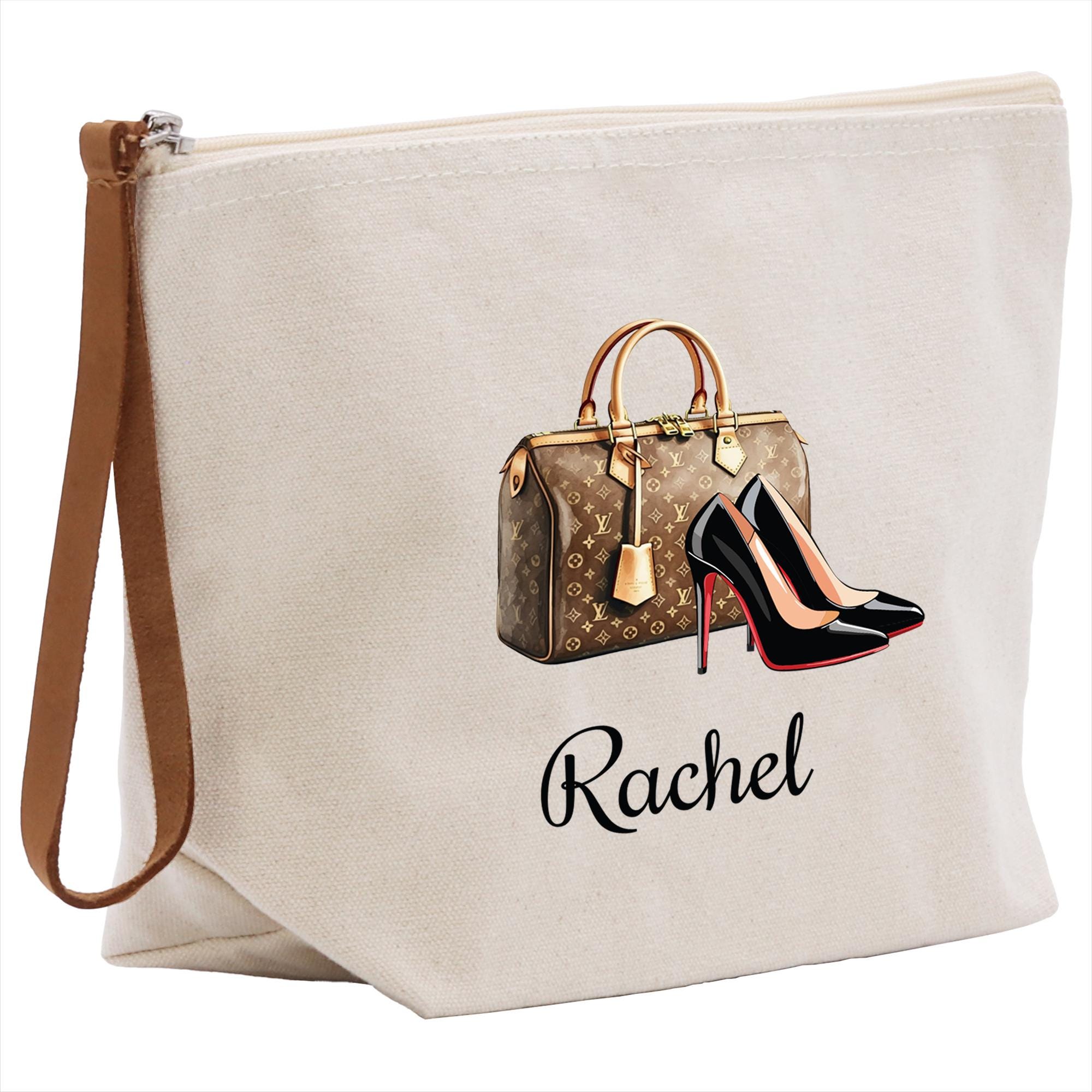 a white bag with a pair of high heel shoes on it