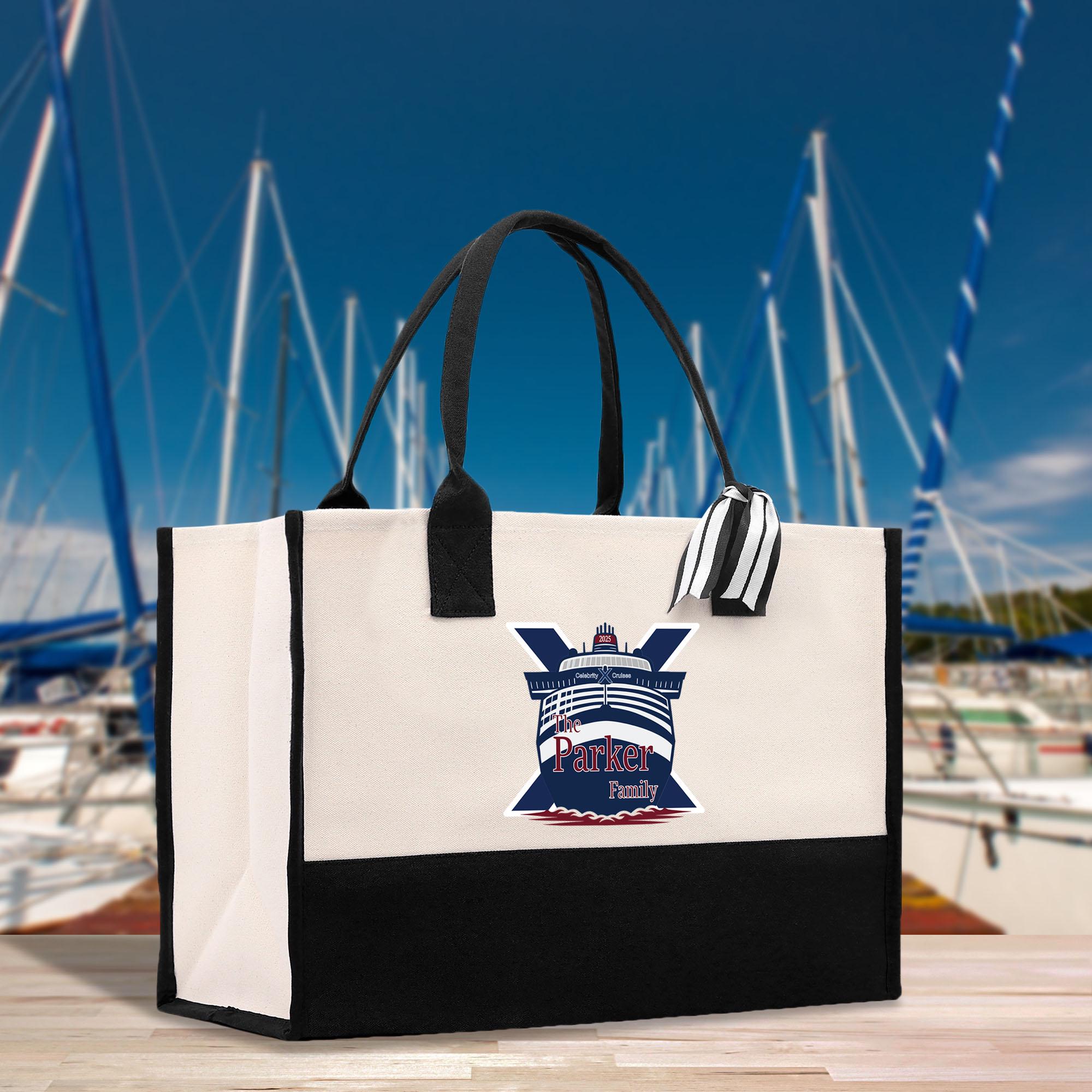 a white and black bag with a picture of a boat on it