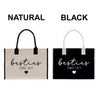 two tote bags, one in natural black and the other in black, both with the text "besties" printed on them.