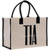 a white and black shopping bag with a logo on it