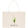 a white shopping bag with a picture of a flower
