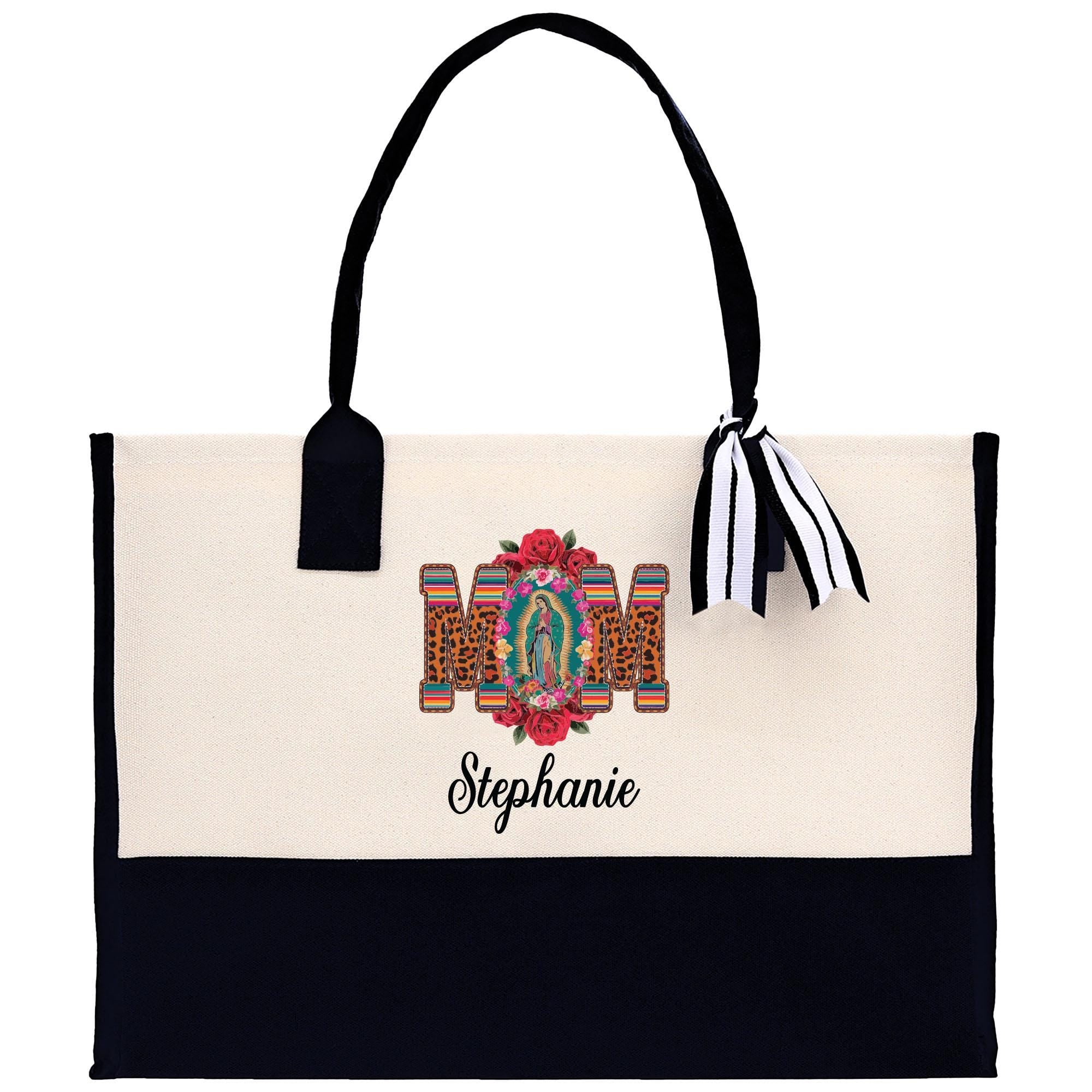 a white and black bag with a black handle