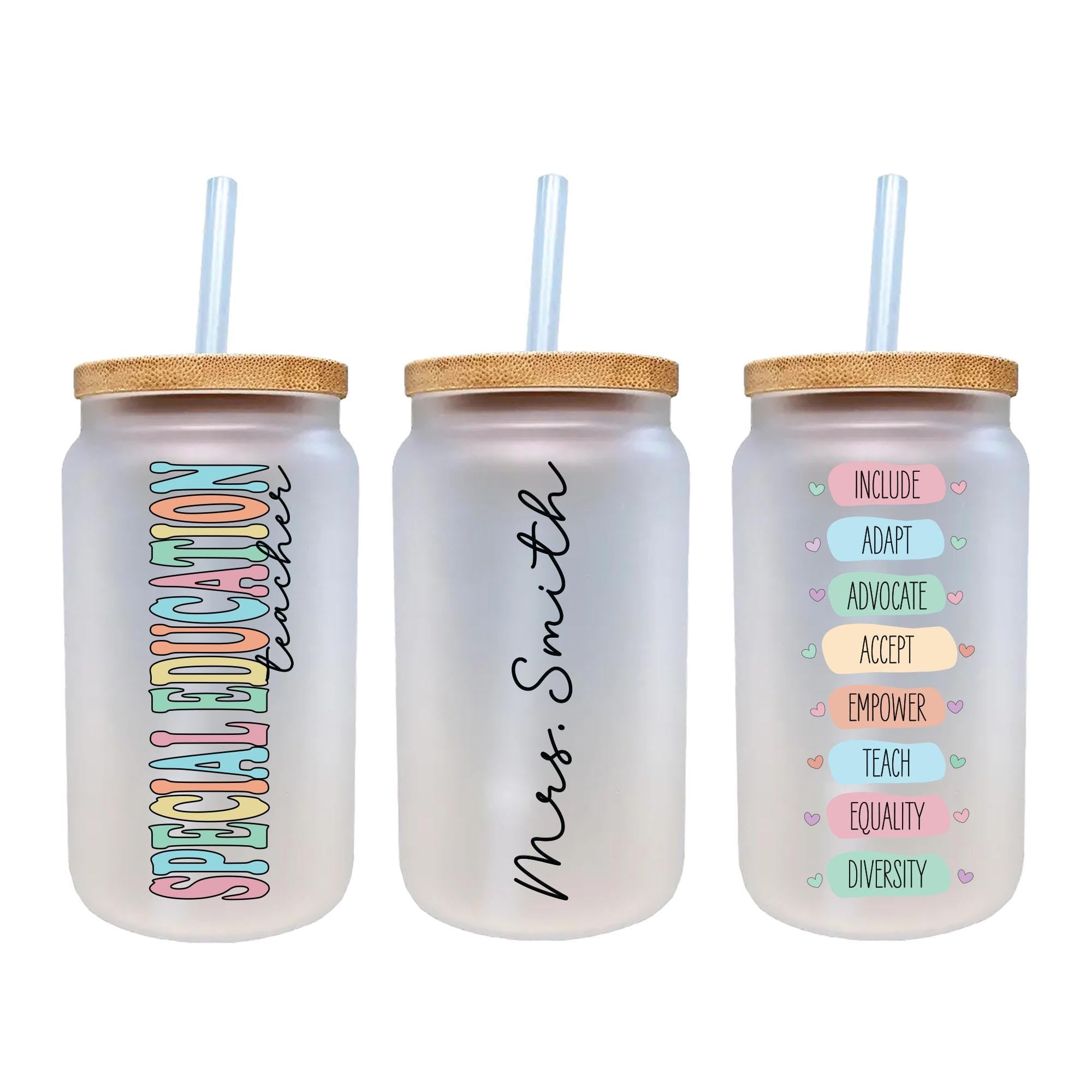three personalized water bottles with straw tops