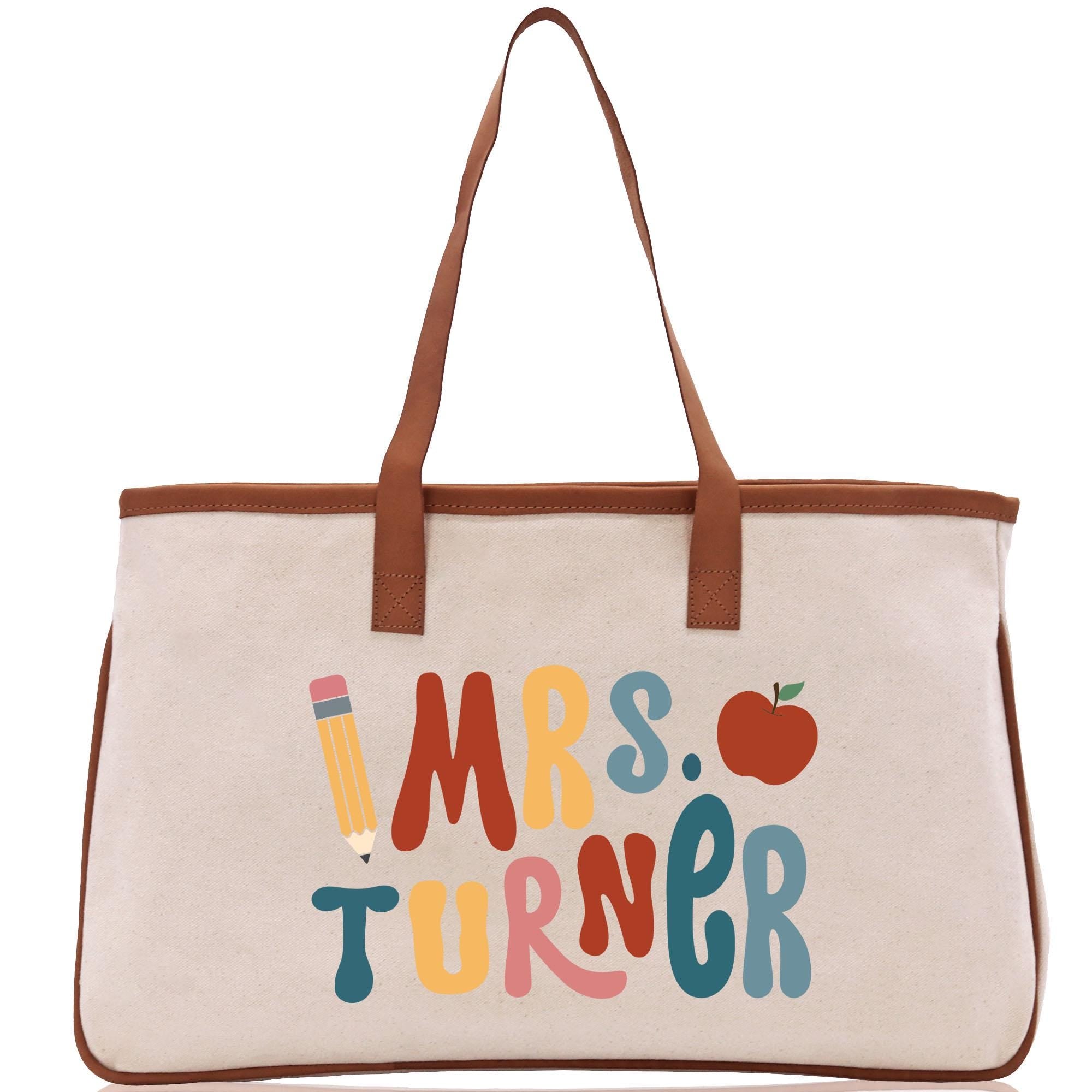 a canvas bag with a teacher&#39;s message on it