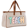 a canvas bag with the word teach painted on it