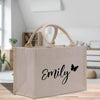 a canvas bag with a butterfly and name on it