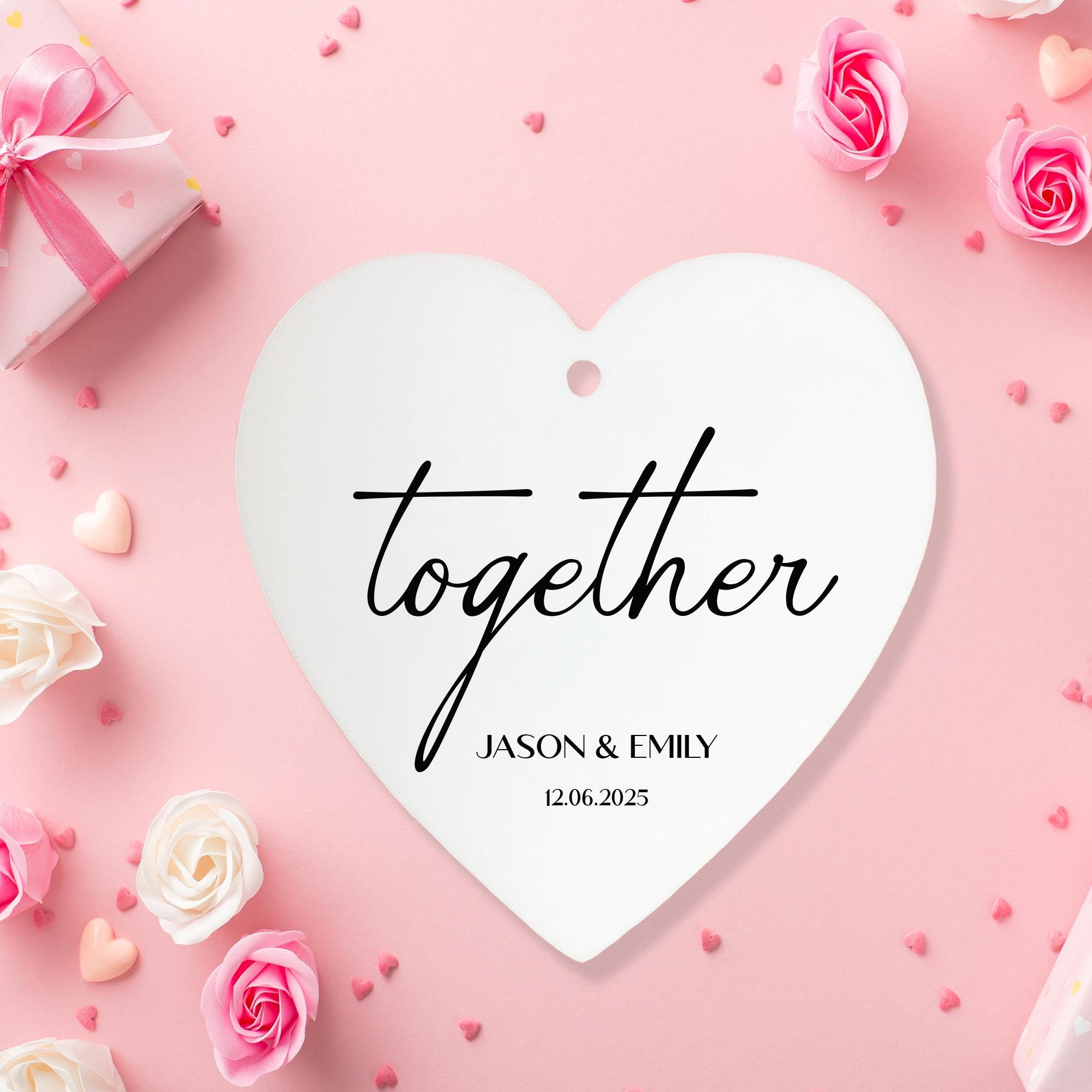 a white heart with the words together on it