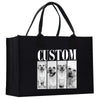 A black tote bag with a custom dog photo printed on it.