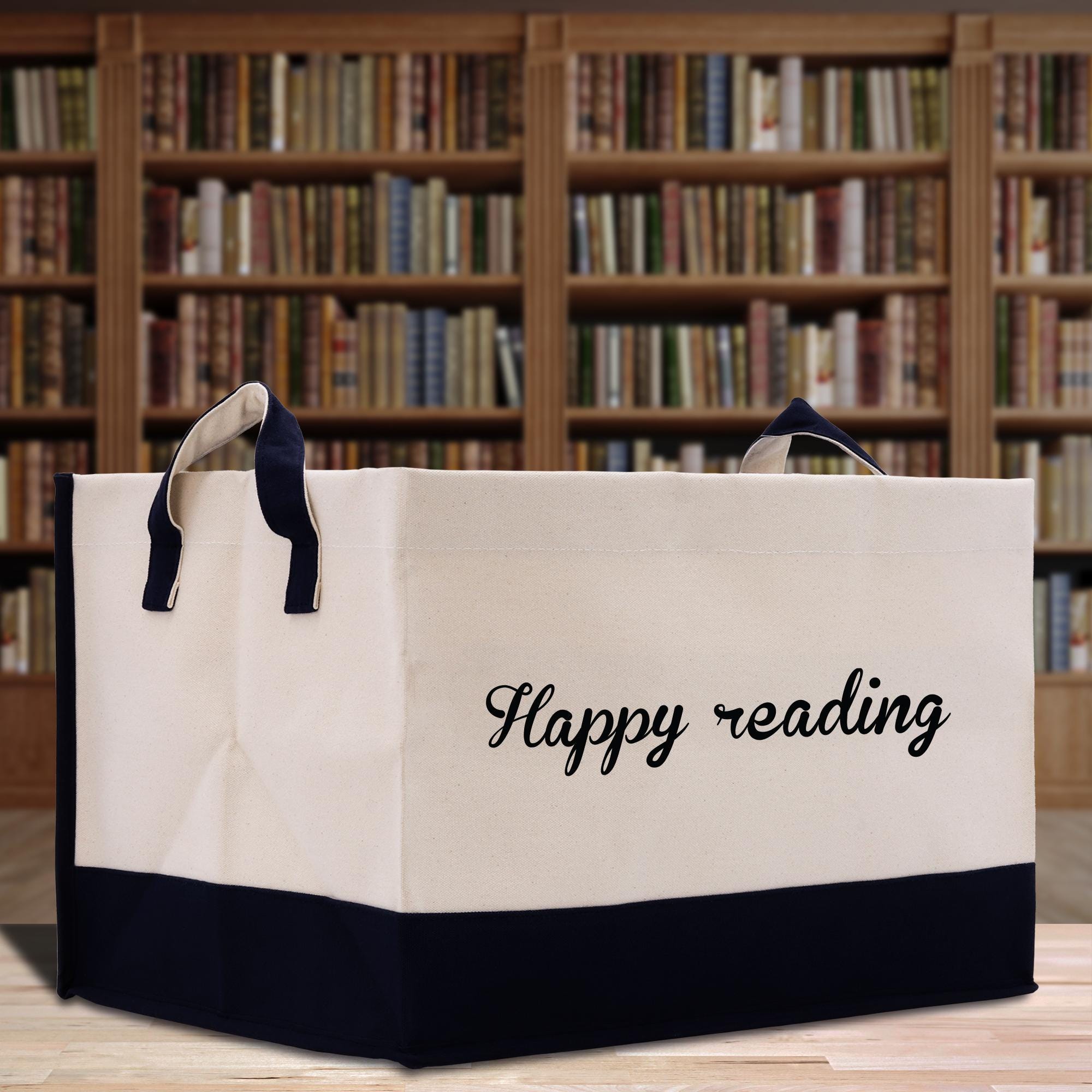 a large white bag with the words happy reading printed on it