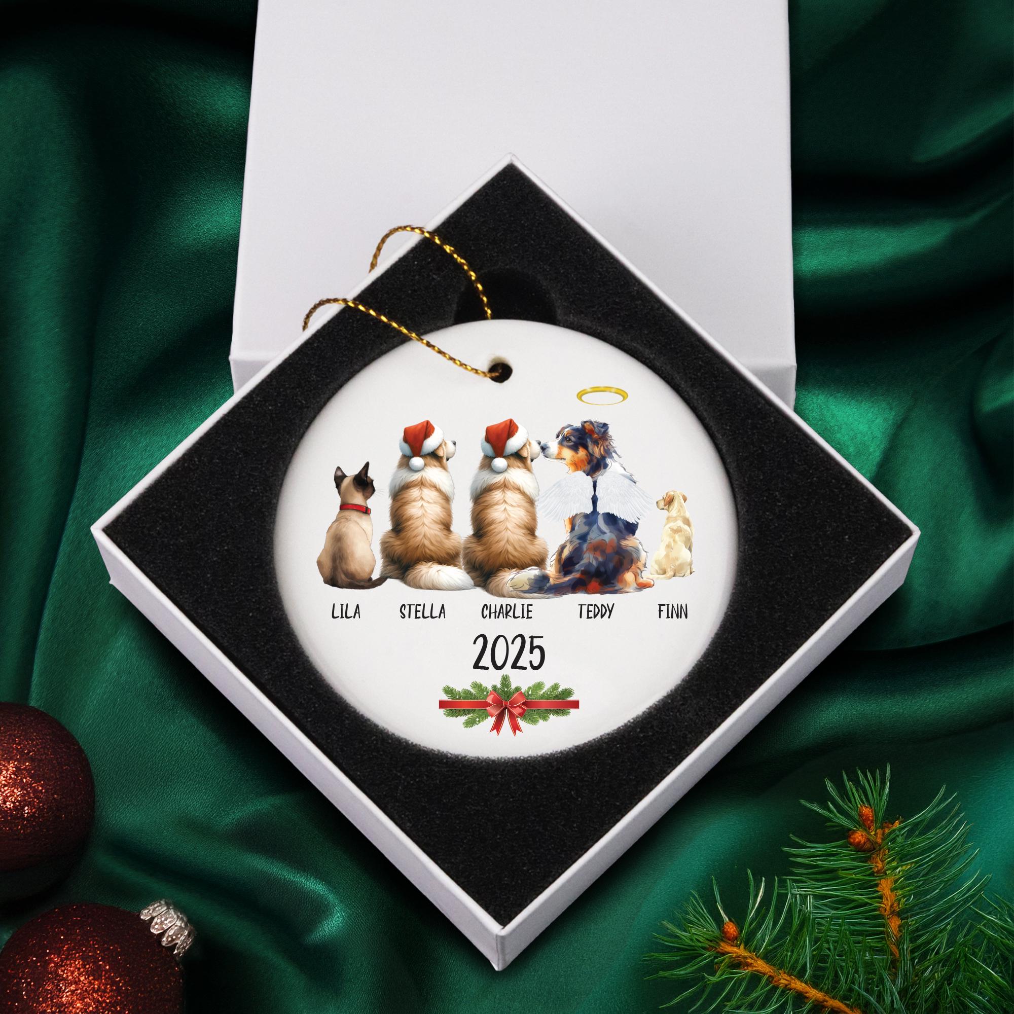 a christmas ornament with three dogs on it