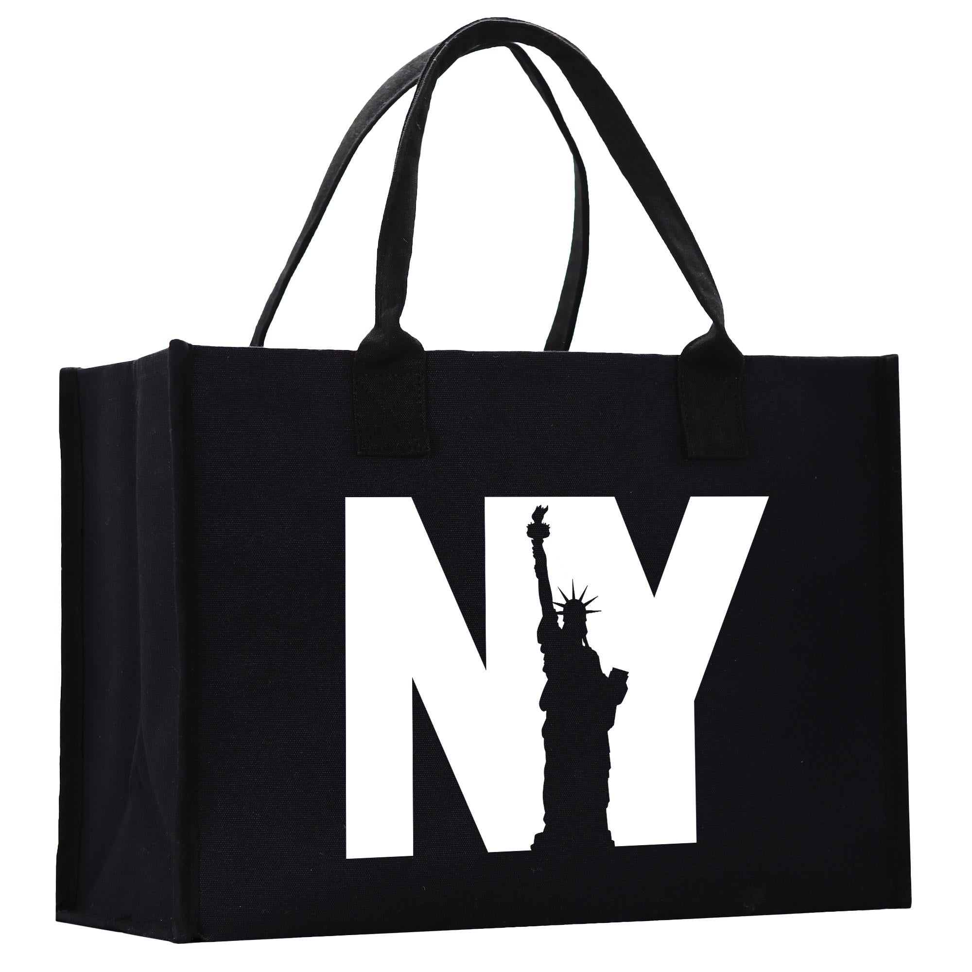 a black new york bag with the statue of liberty on it