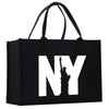 a black new york bag with the statue of liberty on it