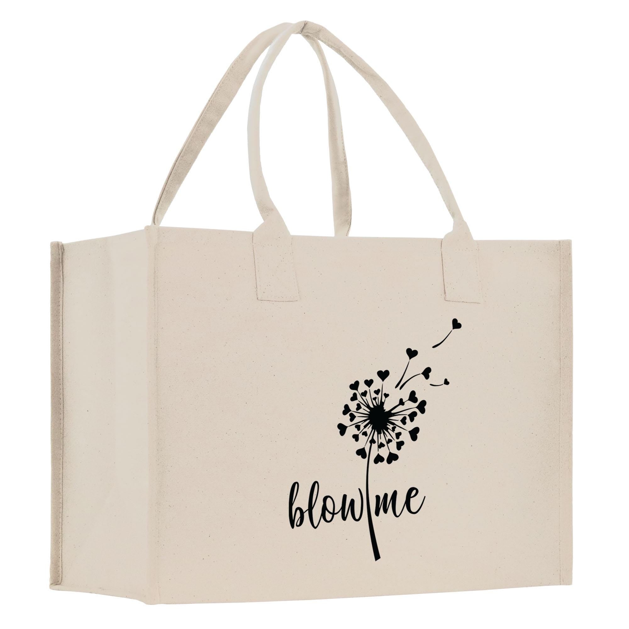 a white shopping bag with a dandelion on it