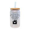 a white mason jar with a straw in it