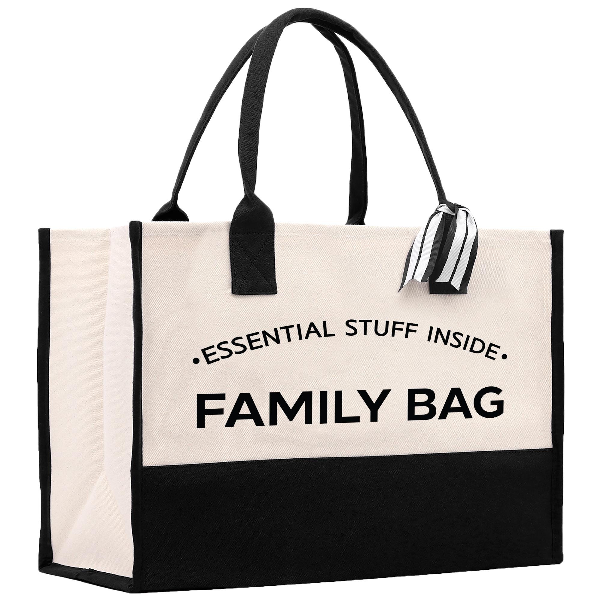 a white and black bag with a black handle