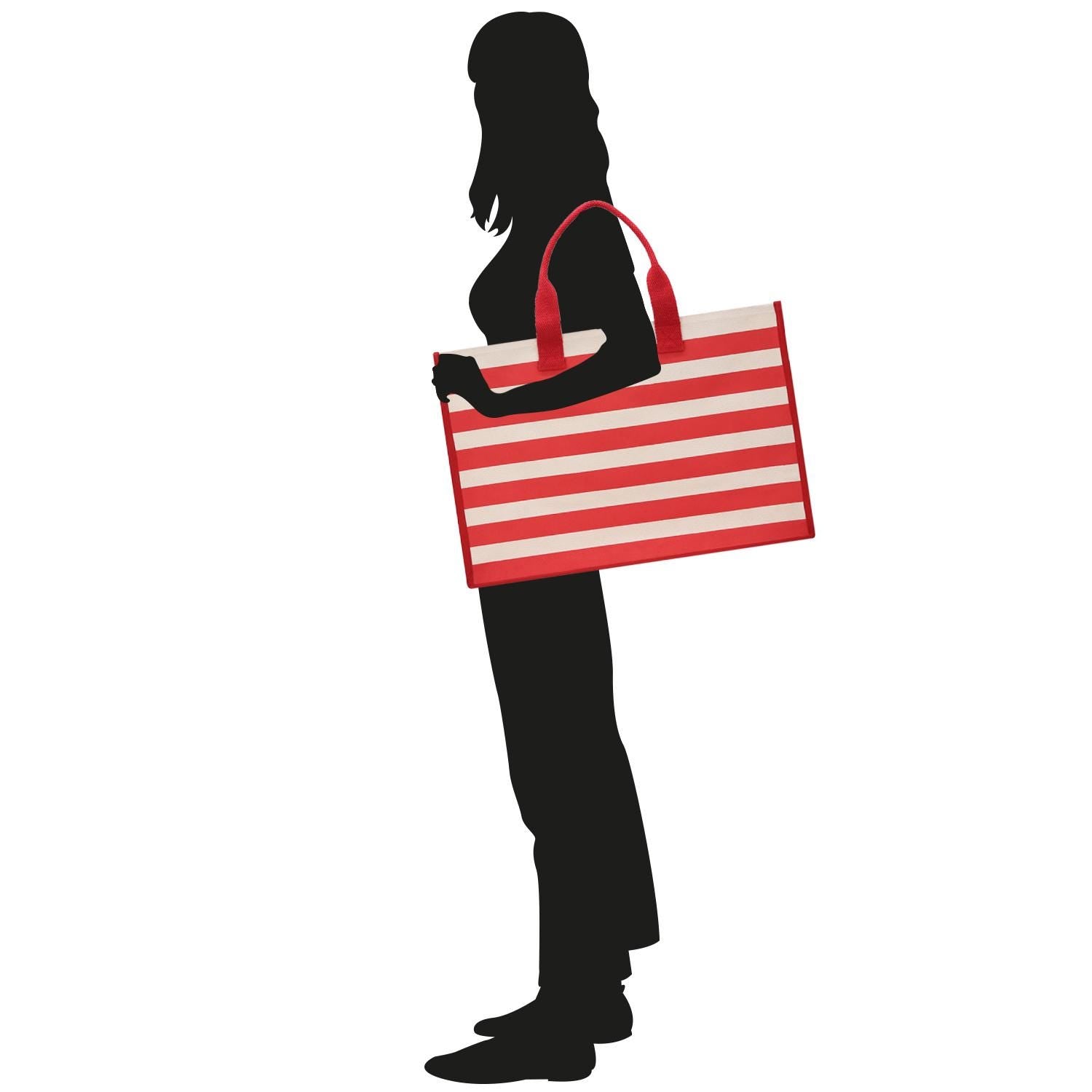 A silhouette of a woman holding a large red and white striped bag.