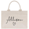 a white bag with a heart and name on it