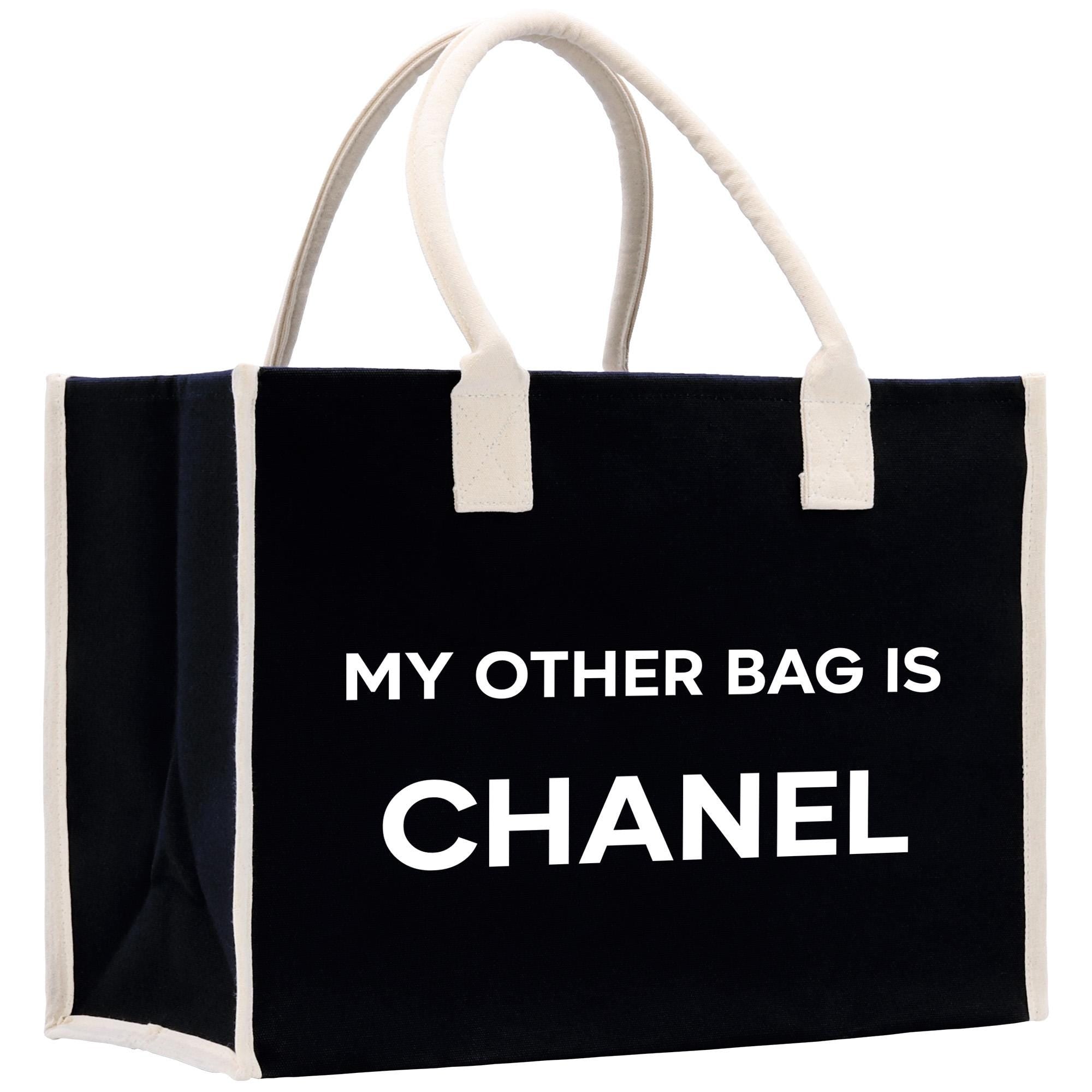 a black and white bag that says, my other bag is chanel