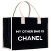 a black and white bag that says, my other bag is chanel