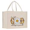 a shopping bag with a flower on it