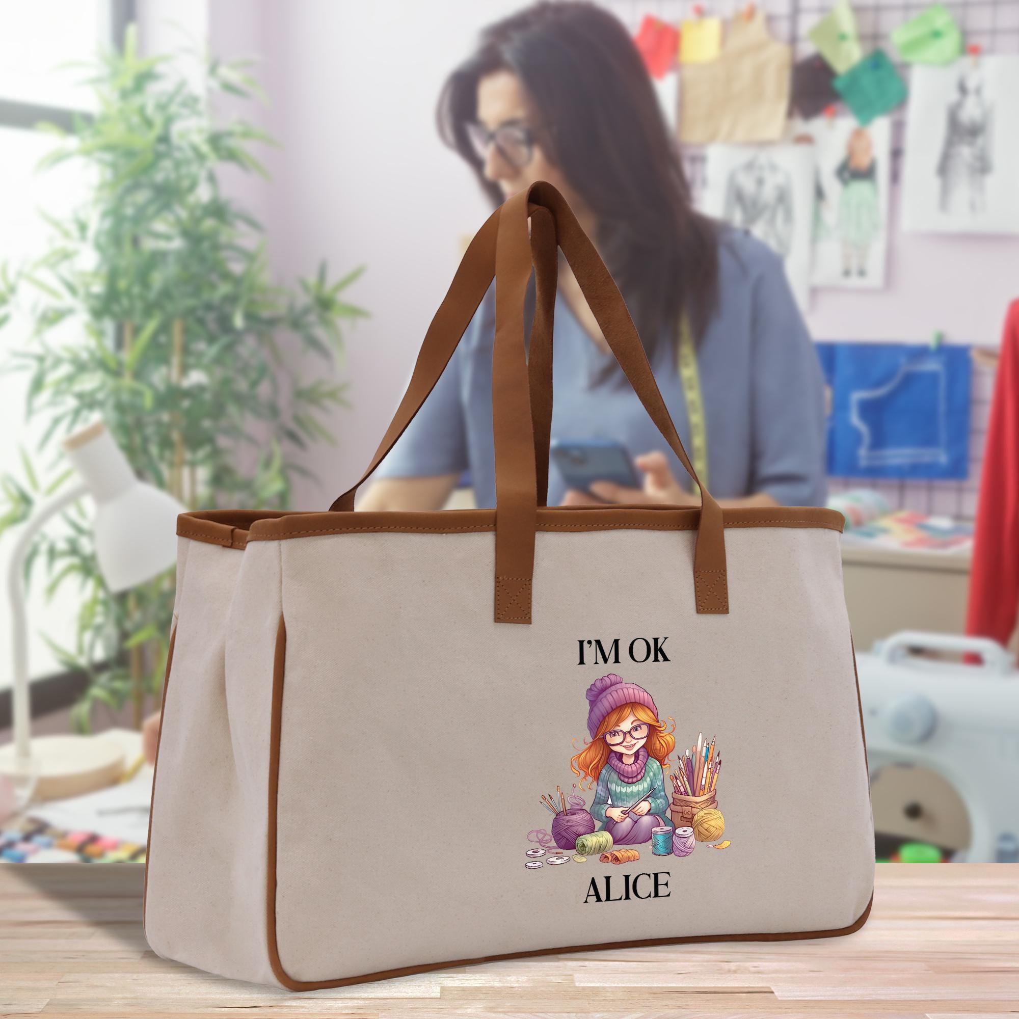 a woman sitting at a table with a bag
