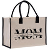 a white bag with black handles and the word mom printed on it