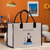 a shopping bag with a picture of a woman holding a wine glass