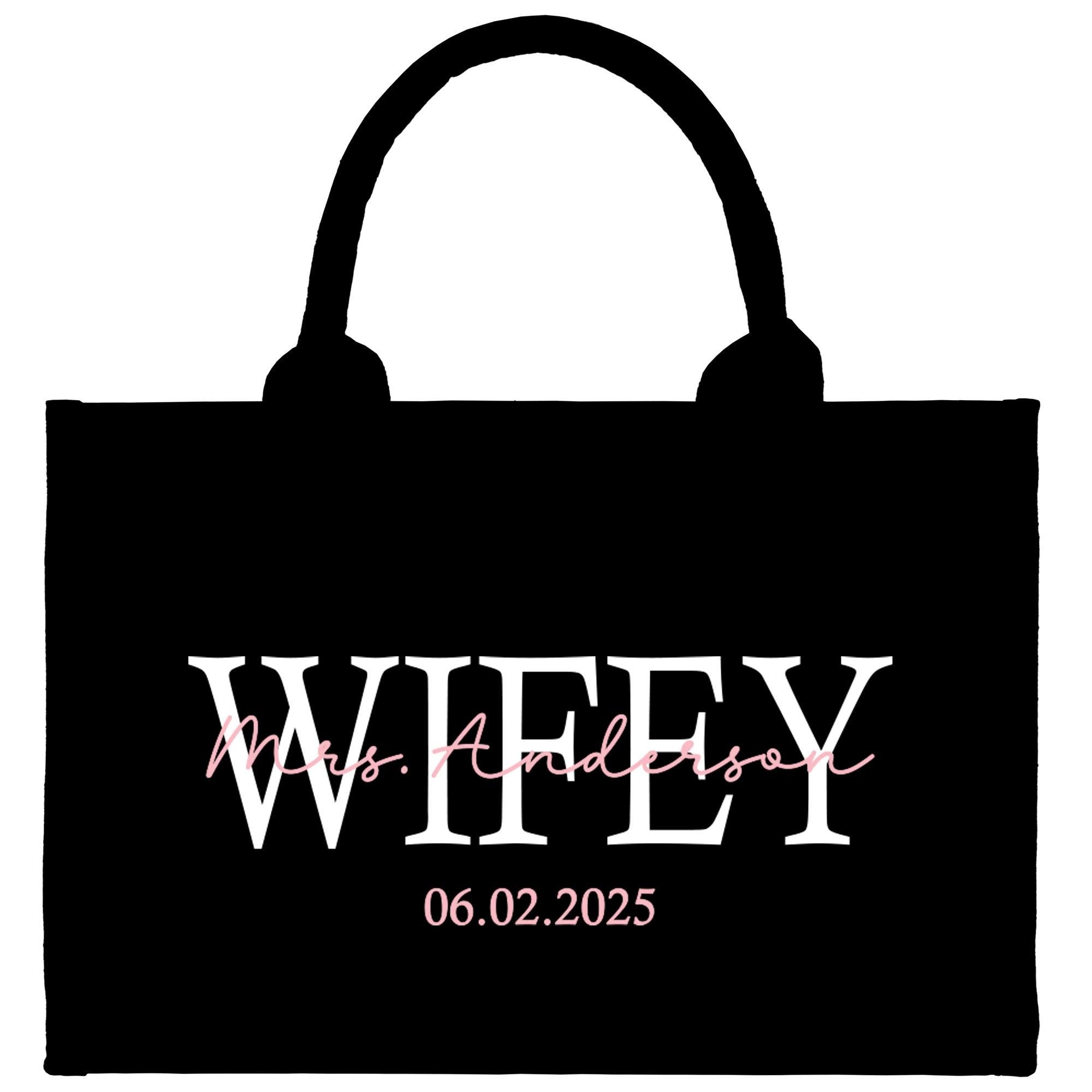 a black bag with the words wife on it