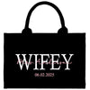 a black bag with the words wife on it