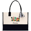 a white and black bag with a black handle