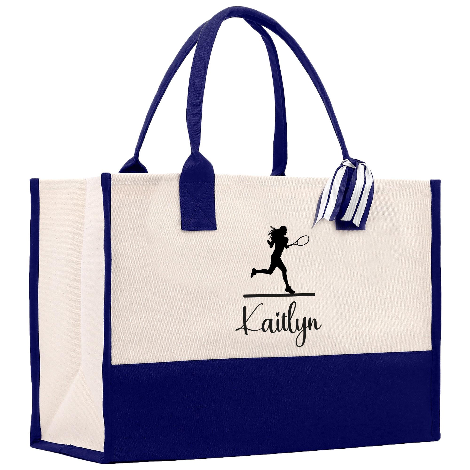 A large tote bag with a white and blue color scheme, featuring a tennis player silhouette and the name &quot;Kaitlyn&quot; printed on it.