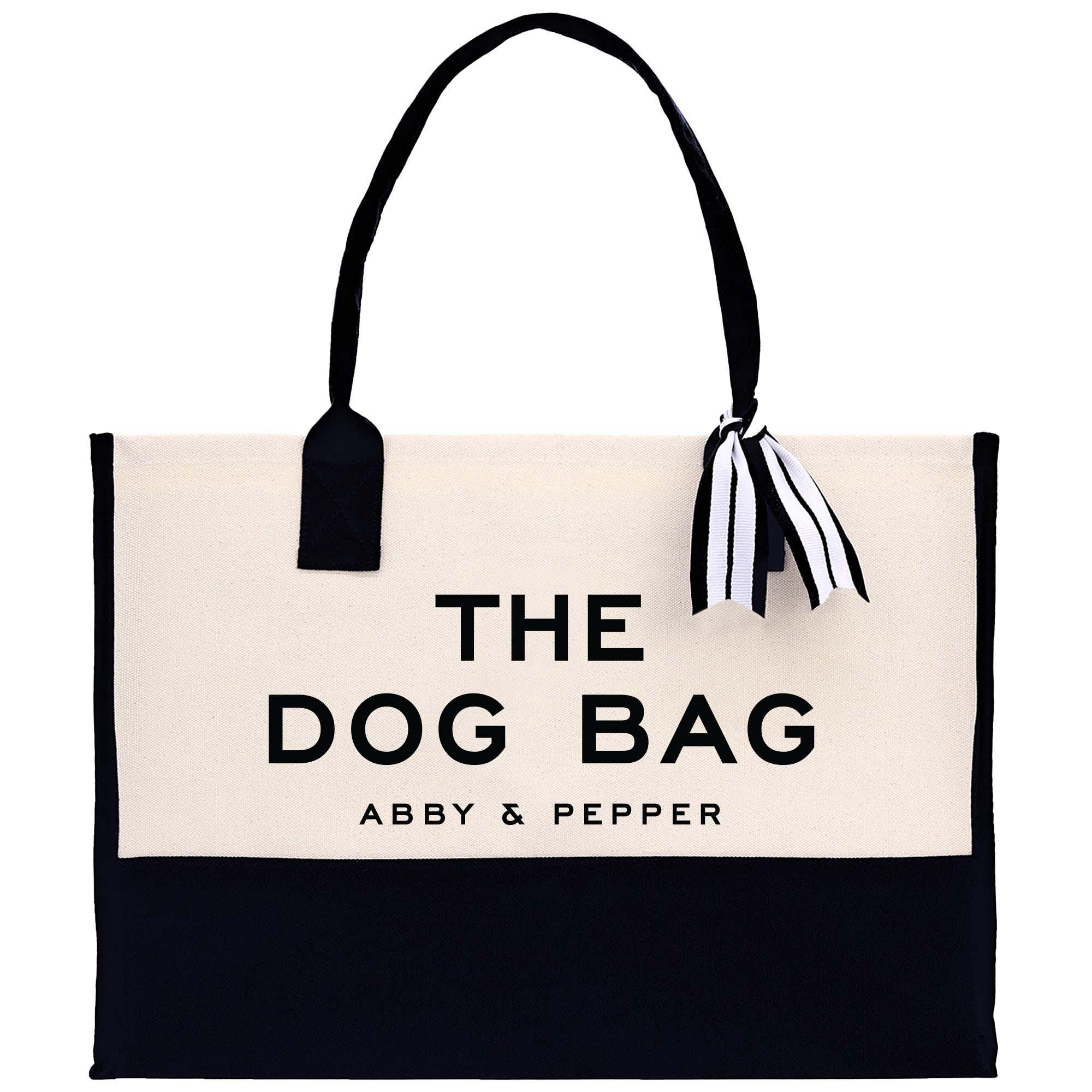 a black and white bag with a black and white striped handle