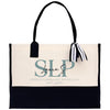 a black and white bag with a monogrammed logo