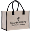 a white and black bag with a palm tree on it