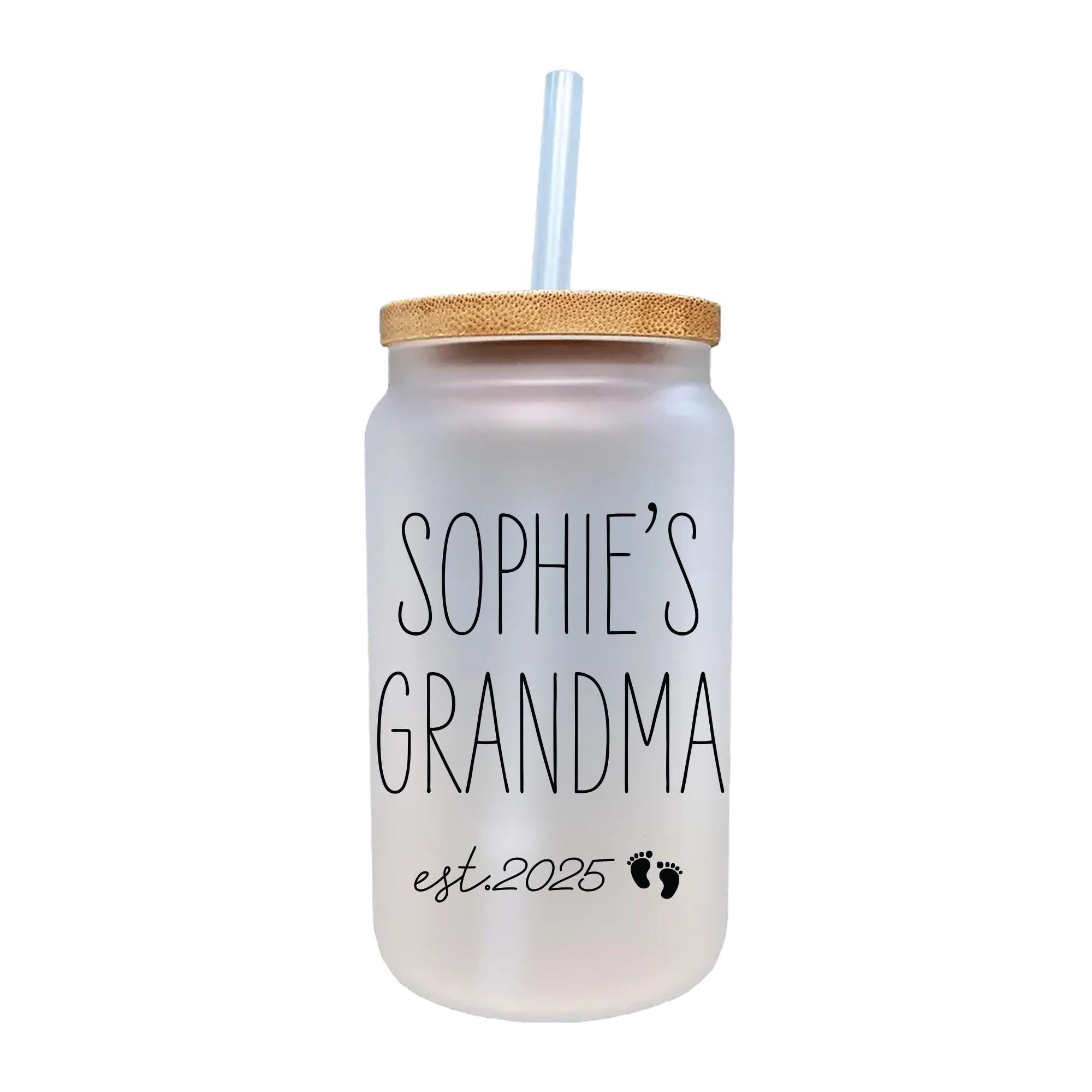 a glass jar with a straw in it