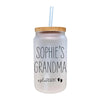 a glass jar with a straw in it